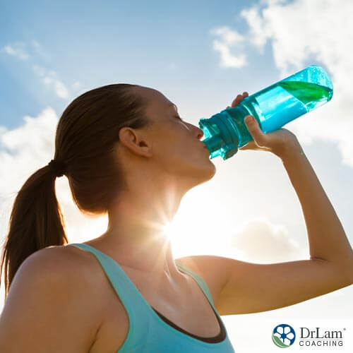 girl drinking water may be at risk for hyponatremia