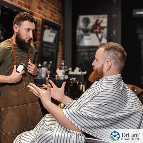 man using venting therapy with his barber.