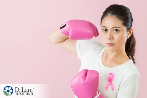 Woman with boxing gloves, symbolizing the potential of kefir to fight cancer