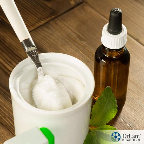 stevia leaf extract and a jar of sugar