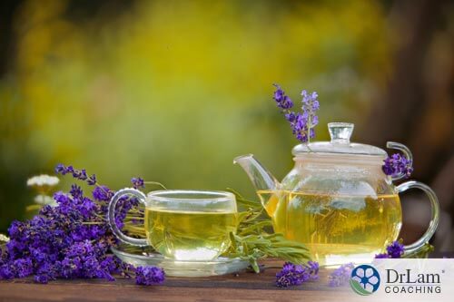 tea pot and tea cut of lavender drinking tea