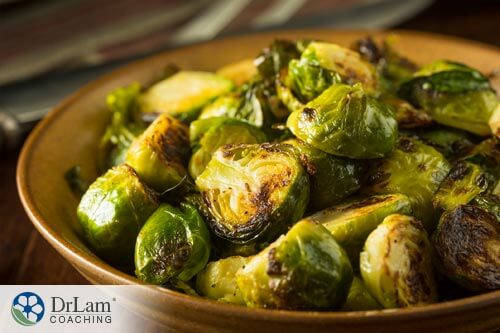 a plate of brussel sprouts that are good foods that contain vitamin c