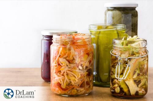 jars of pickled vegetables and probiotics to help with bone mass