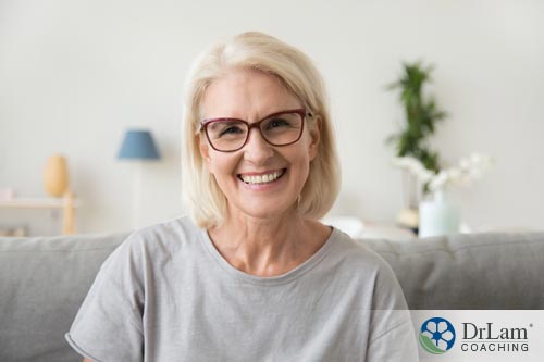 an image of an older woman smiling from eating high protein vegetarian food