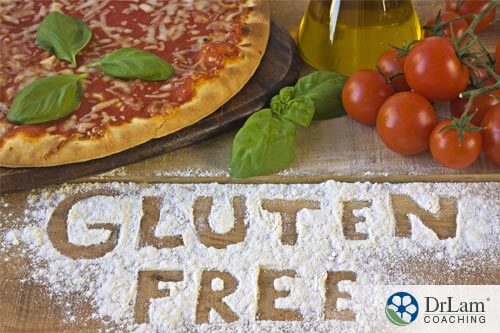 Gluten-Free Pizza on a table with gluten-free written in flour