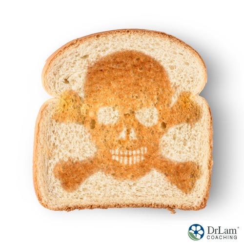 A skull burnt on a piece of toast to show that Almond bread is a healthier alternative