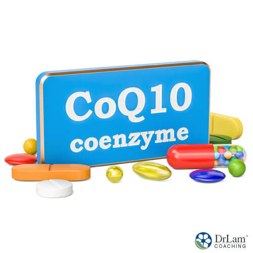 An image of a blue sign with CoQ10 coenzyme on it with supplements spread around it