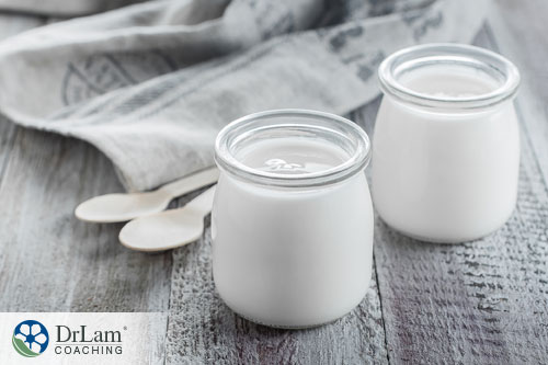 An image of plain yogurt in small glass jars