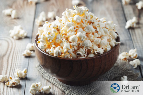 An image of a wooden bowl of popcorn