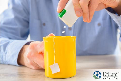 A man putting sweetener to his tea. The same ingredient used in diet soda