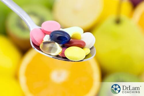 picture of a spoon holding supplements good for obesity and gut bacteria
