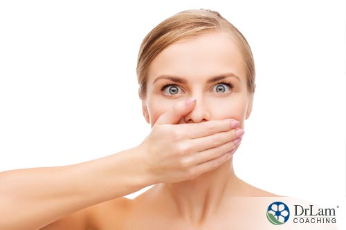 A woman with halitosis dealing with body odor issue