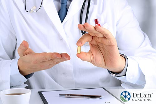 a doctor holding dietary supplements