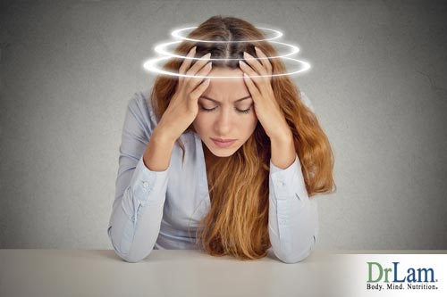Woman suffering from a spinning head. What causes dizziness for her?