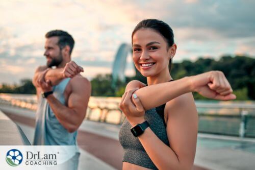 An image of a man and woman exercising