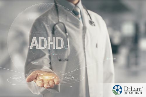  A doctor holding an ADHD hologram in his palm