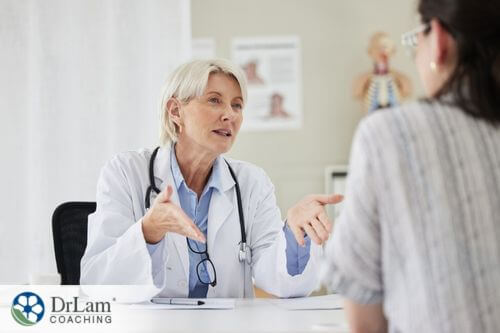 An image of a woman talking with her doctor
