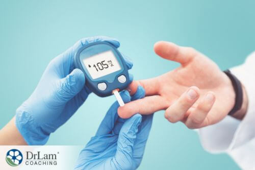 An image of someone having their blood sugar tested