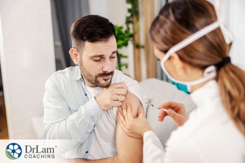An image of a man getting an injection