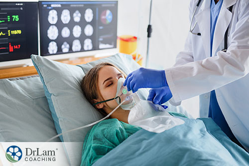An image of a young woman on oxygen in a hospital