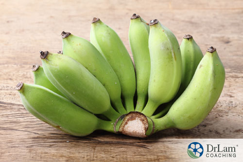 An image of a green bunch of bananas