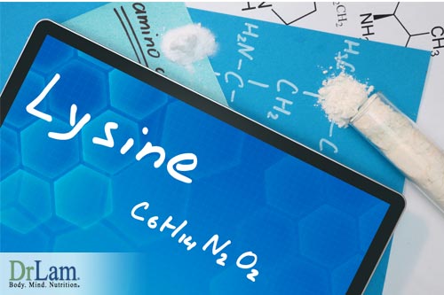 Written molecular composition of lysine on tablet device, next to papers with drawn structure of lysine, and a small amount of lysine powder nearby. Image represents scientific studies that were done to determine the anxiety reduction benefits of lysine.