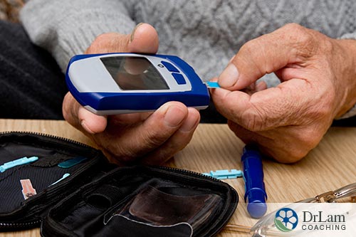 An image of someone using a blood sugar monitor