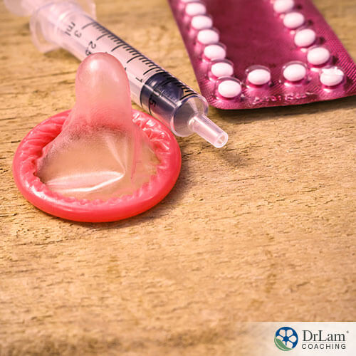 an image of a condom and pills for birth control