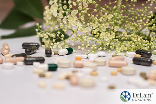 An image of several different kinds of supplements spread out on a table top