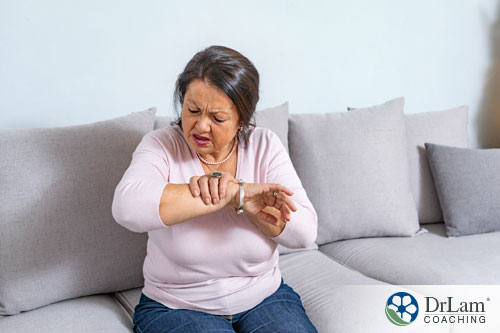 An image of an older woman that has arthritis pain