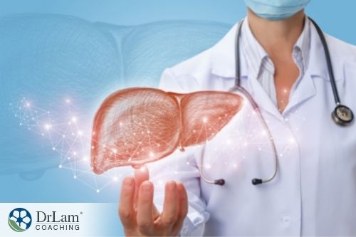 An image of a doctor holding up a holographic image of a liver