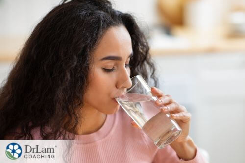 An image of a woman drinking water