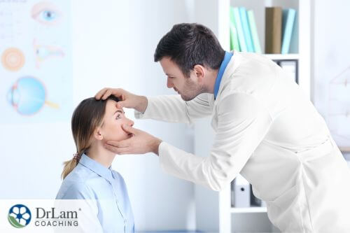 An image of a woman having her eyes checked