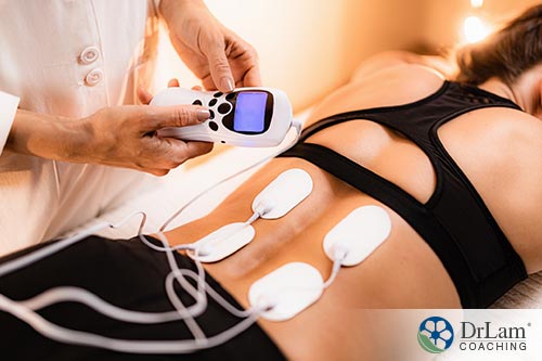 An image of a woman receiving electric therapy