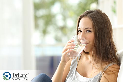 An image of a woman drinking water