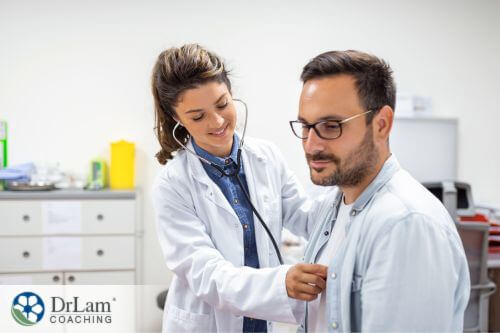 An image of a doctor giving a patient a check up.