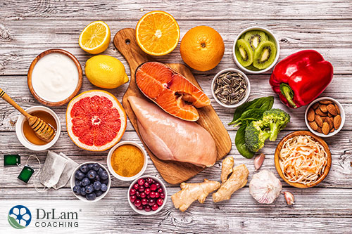 An image of immune boosting foods arranged on a wood table