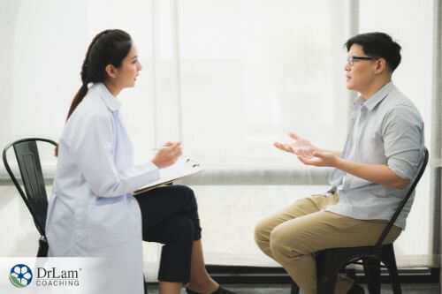 An image of a man talking with a Therapist
