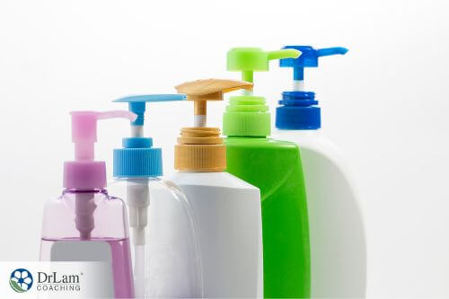 An image of five bottles of lotion