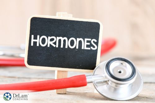 An image of a sign saying hormones next to a stethoscope