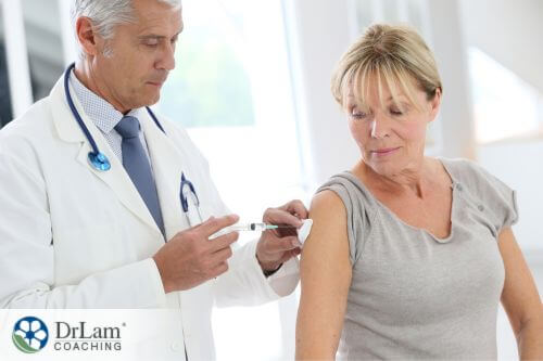 An image of a woman getting an injection from her doctor