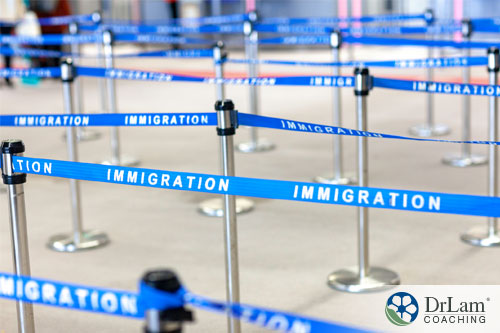An image of empty immigration lines at an airport. It's important to compare different groups and how immigration and gut microbiome are effected
