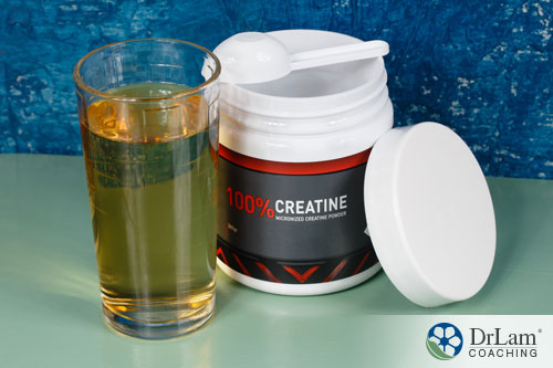 An image of a creatine supplement in a jar and a glass