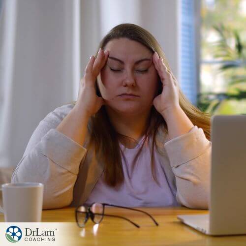An image of a woman suffering from adrenal fatigue