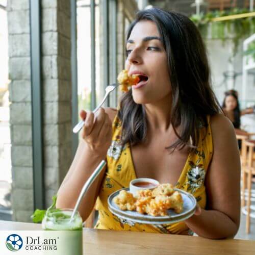 An image of a woman eating