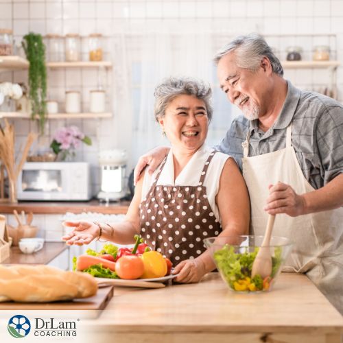 An image of an older couple making a salad together