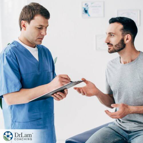 An image of a man talking with his doctor