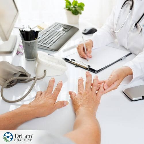 An image of someone showing both hands to a doctor
