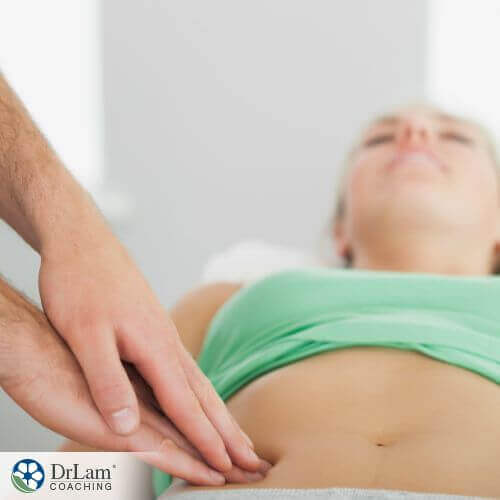 An image of a woman having an exam on her abdominal area