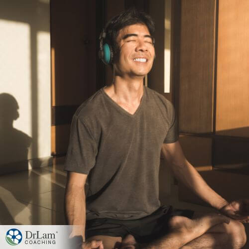 An image of a man doing yoga in the sunlight